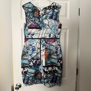 Worn dress. Fits nice, I've gained weight and no longer fits.